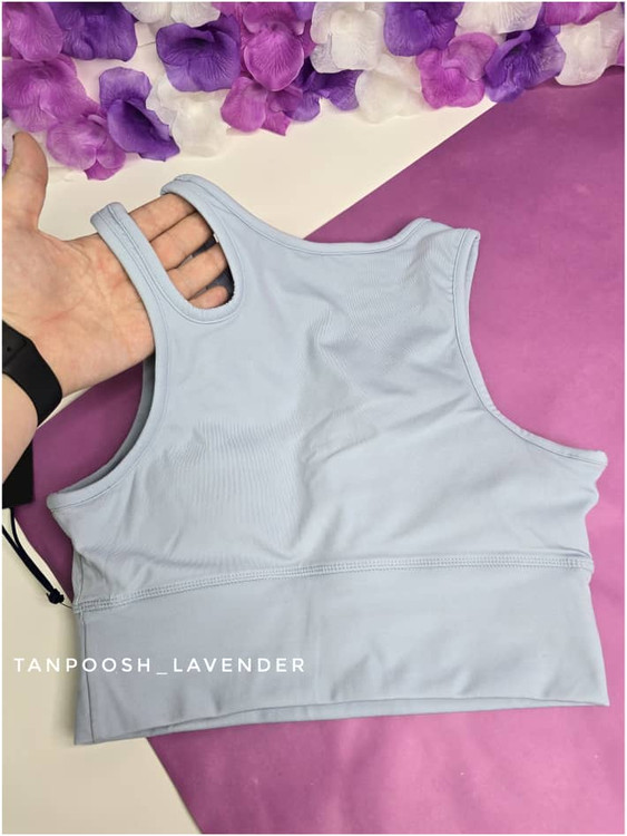 نمای پشت نیمتنه ورزشی فیلا رنگ آبی روشن