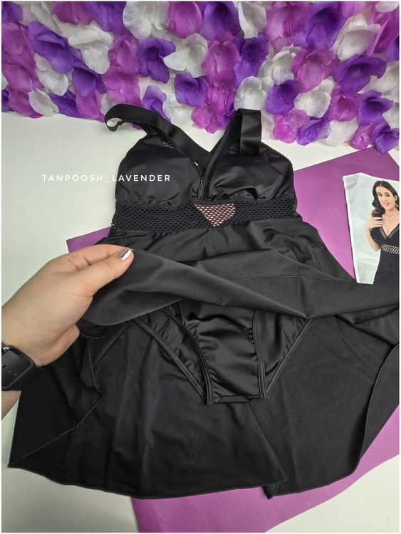 مایو یکپارچه مشکی با جزئیات توری و بندهای متقابل