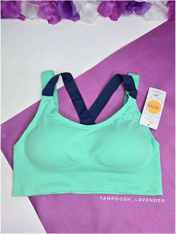 نیمتنه ورزشی زنانه نخی کشسان پشت ضربدری رنگ سبز پاستلی با پد متحرک