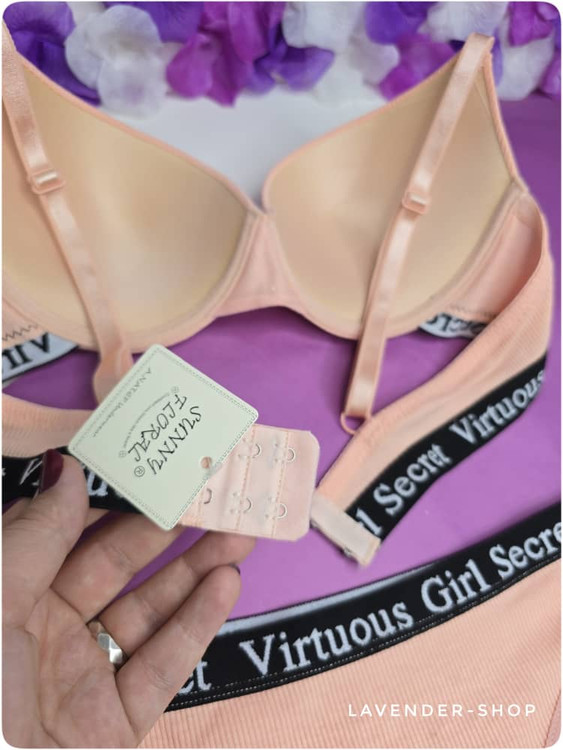 نمای نزدیک شورت نخی کبریتی رنگ گلبهی با کش مشکی برند Girl Secret