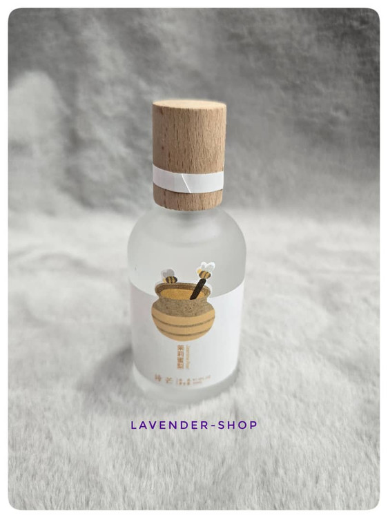 بطری فانتزی عطر بیکینی زنانه رایحه عسل با رنگ طلایی و شفاف