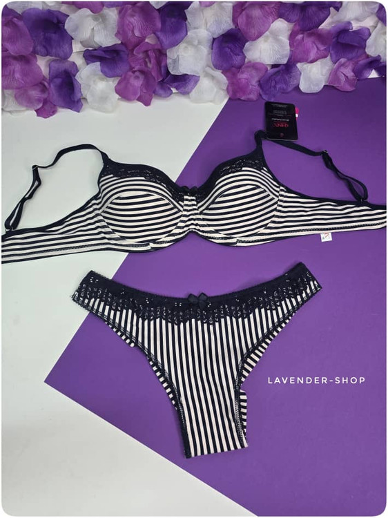 نمای نزدیک از کش کمر شورت هونکس راهراه و دوخت دقیق برند ترک