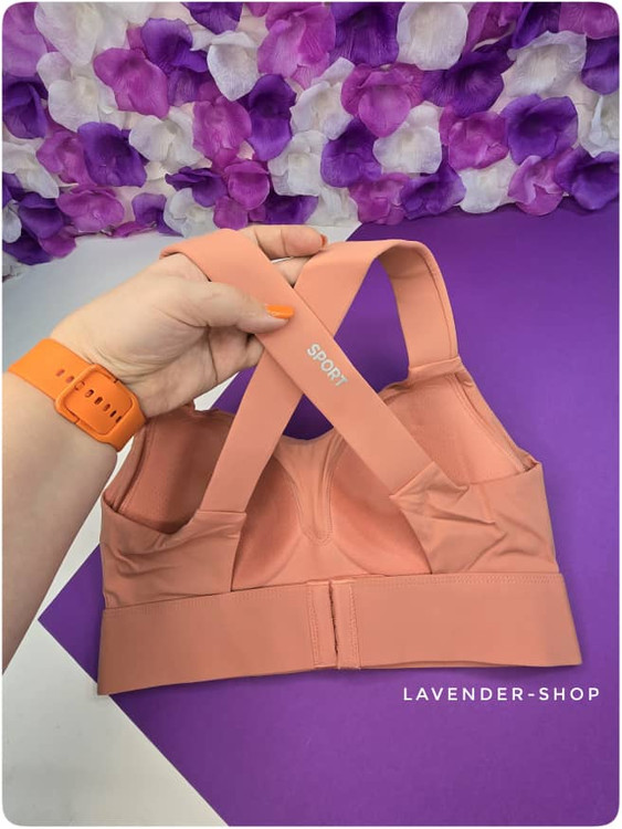 نیمتنه زنانه گلبهی با طراحی پشت ضربدری و قزن قابل تنظیم – نمای پشت – مناسب باشگاه.