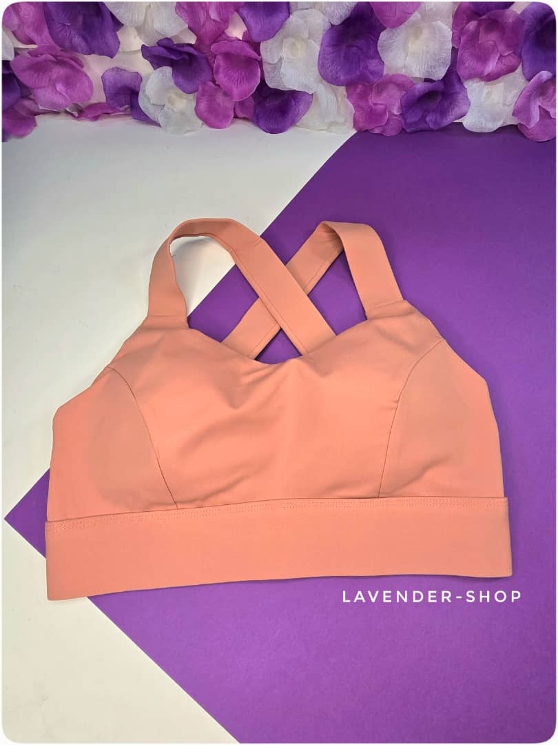 نیم‌تنه ورزشی زنانه رنگ گل‌بهی با جنس فلامنت و کاپ پرسی – نمای جلو – تنخور راحت و سبک.