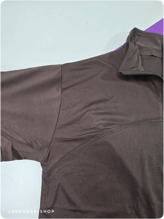 نمای کنار تیشرت نیمزیپ زنانه نایک